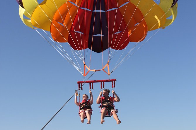Parasailing Adventure Fly to Sky with Hotel Pickup - Hurghada - The boat staff, photo upsells, and how to protect your wallet