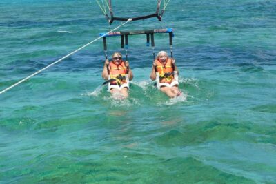 Parasailing Grand Turk - Board the Premium Parasail boat: harnessing, water, and a bumpy ride