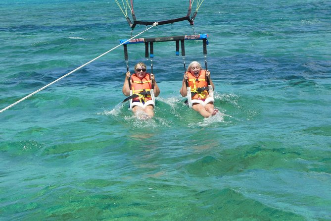 Parasailing Grand Turk - Board the Premium Parasail boat: harnessing, water, and a bumpy ride