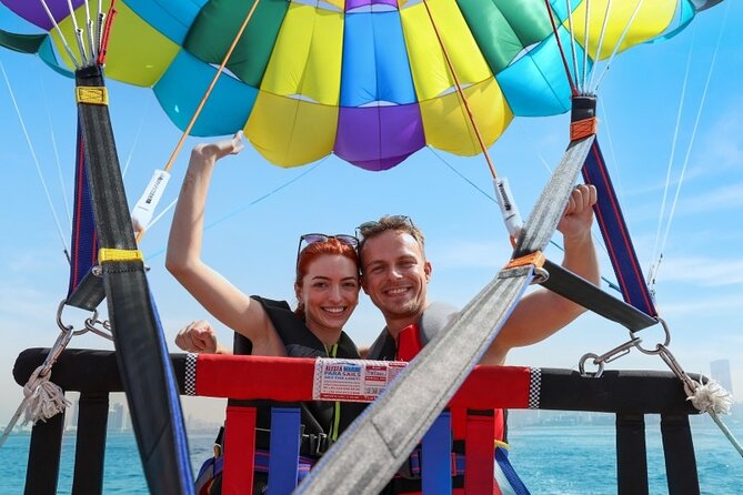 Parasailing in Dubai with Palm Jumeirah and JBR Beach views - Sea Life Watersports Dubai: Meeting Point Tips That Save Time