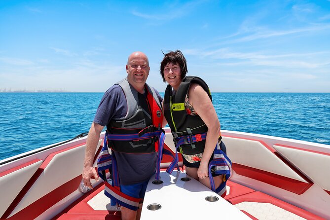 Parasailing in Dubai with Palm Jumeirah and JBR Beach views - Harnessing Up Safely: What You Should Expect Before Takeoff