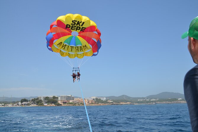 Parasailing in Ibiza with HD Video Option - Boat Time: Music, Drinks, and the Reality of Group Rotations