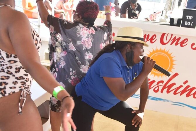Party Catamaran: OpenBar, Music, Negril Beach, Caves, Snorkeling - Boarding the Catamaran: The Wet, I-Mean-Wet Part