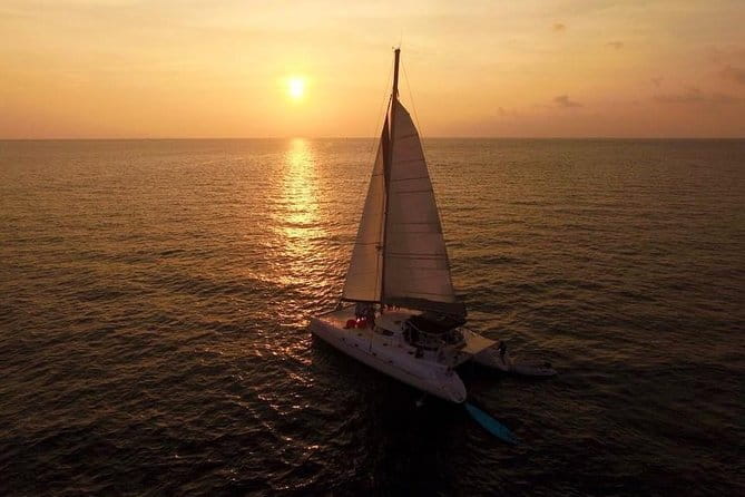 Phuket: Aeolos Catamaran Tour to Coral & Racha Islands + Lunch - Promthep Cape sunset and handline fishing: the return that feels like a bonus