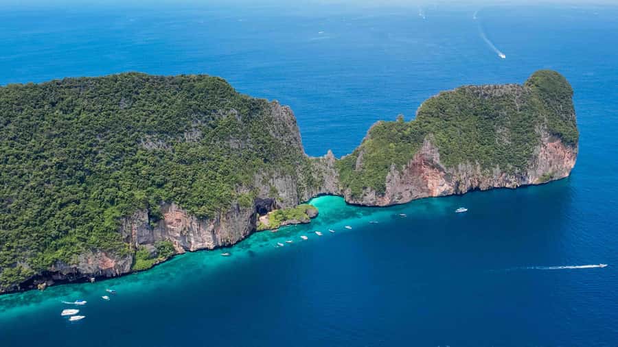 Phuket: Phi Phi, Maya & Bamboo By Premium Speed Catamaran - Bamboo Island beach time: swimming and snorkeling with realistic expectations