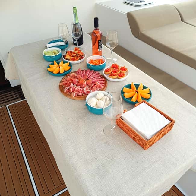 Polignano a Mare: Catamaran Tour with Aperitif & Local Food - Lama Monachile Beach: your sea-level photo stop before the tour really warms up