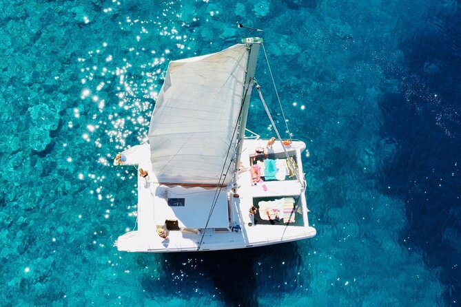 Porto Conte: Half-day catamaran tour with aperitif - Porto Conte catamaran basics: what you’re booking in 3 hours