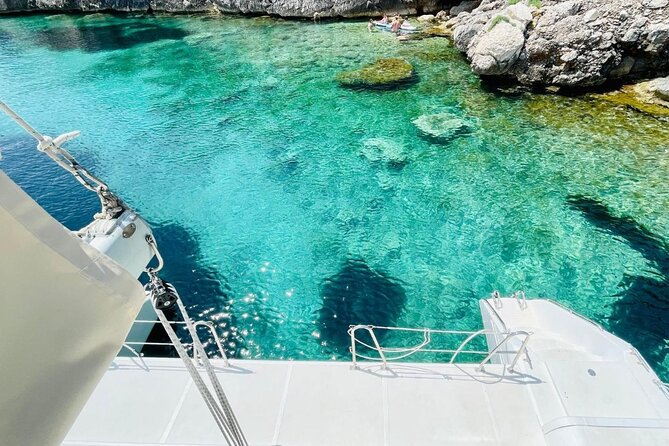 Porto Conte: Half-day catamaran tour with aperitif - Cala Dragunara: the swim stop that turns the tour into a real break