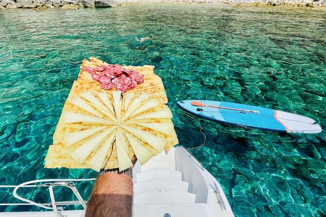 Porto Conte: Half-day catamaran tour with aperitif - Inside the Cat 10 Daag: comfort details that matter at sea