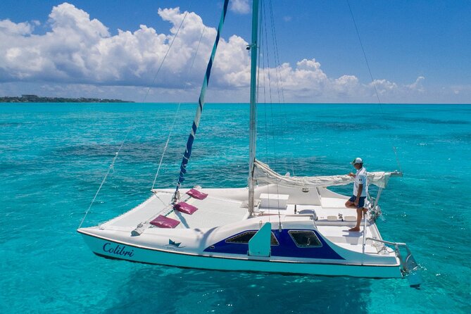 Premium Isla Mujeres Tour by Private Catamaran - Entering the day at Playa Tortugas (and why the timing works)