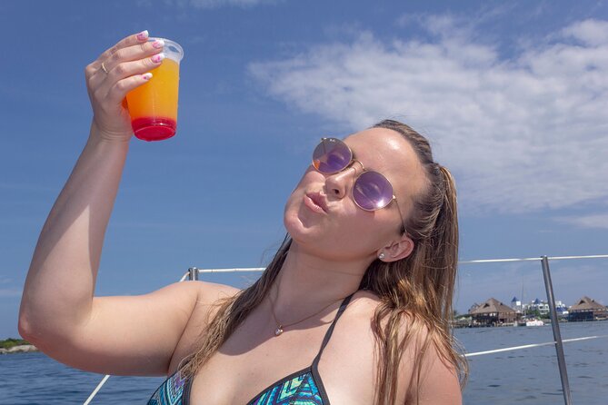 Premium Isla Mujeres Tour by Private Catamaran - Playa Tortugas return and the open bar: when the boat ride becomes part of the fun