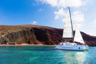 Premium Small-Group Catamaran Cruise with BBQ, Open Bar, Transfer - Apronisi and the caldera coast: the views that justify the boat