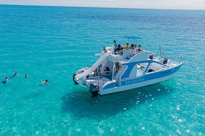 Private 4-Hour Catamaran Tour from Providenciales in Turks and Caicos - Half Moon Bay: beach time, rum punch, and snorkel-friendly water