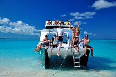 Private 4 Hour Power Catamaran Excursion in Grace Bay - Getting on the water: pickup, shuttle, and meeting point flow