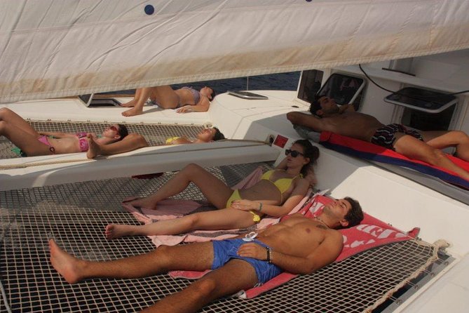 Private Catamaran Beach Hopping in Ibiza - Onboard Comfort: Water, Soft Drinks, Wi‑Fi, and Your Own Music