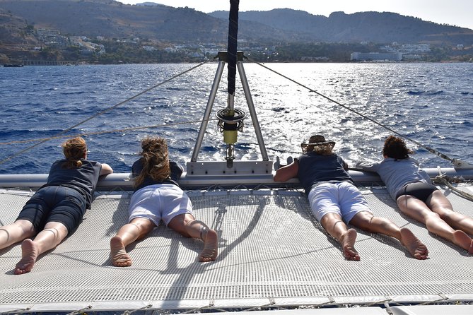 Private CATAMARAN daytrip - Lindos/ Rhodos with Lunch and drinks - Blue Lagoon anchor time: swimming and snorkel with shallow-water access