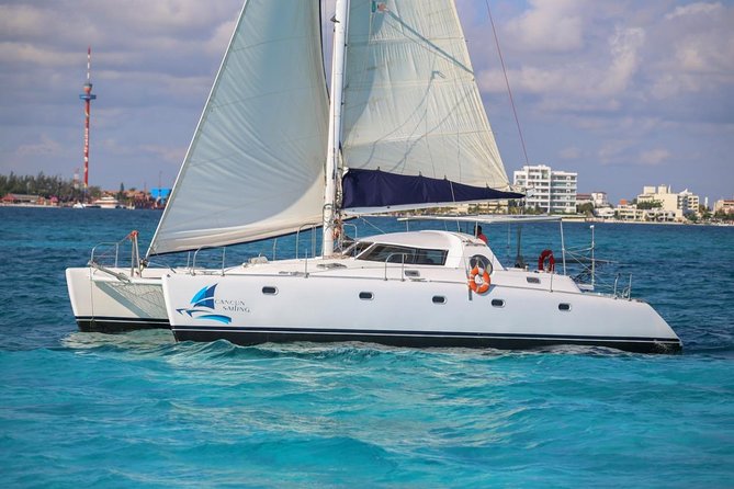 Private Catamaran from Cancun to Isla Mujeres | For up to 40 pp - Open bar and spinnaker sailing: the fun, the rules, and the best moments