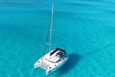 Private Catamaran Tour to Isla Mujeres - On Board: Drinks, Safety Briefing, and a Real Restroom