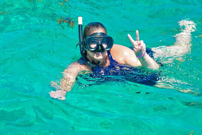 Private Catamaran wonderful Snorqueling slide & entartaiment team - Snorkeling + flotation gear: guided water time, not a random free-for-all