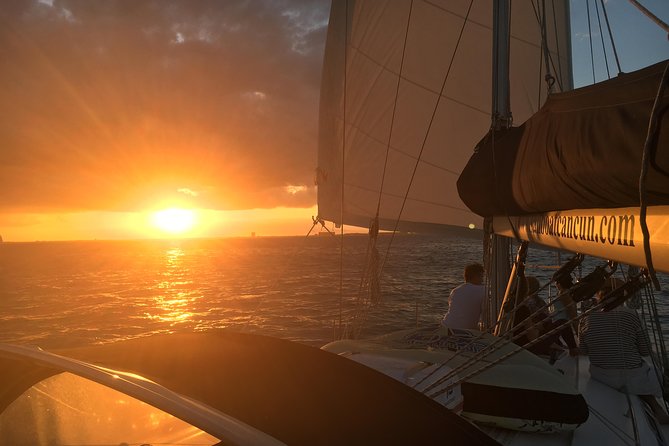Private Customizable Sailing Tour in Cancun - Isla Mujeres anchor time: clear water, snorkeling options, and a floating break