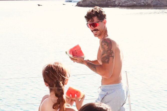 Private Mykonos Catamaran Day Cruise with Meals & Water Toys - Ornos stop: warm-up swims and easy orientation