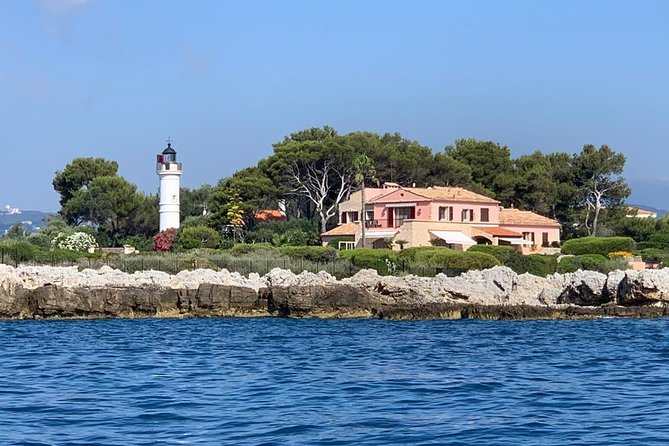 Private ride with sea bath in Solar Catamaran - Stop 1: Cap d’Antibes for cliffs, pebble comfort, and snorkeling-friendly water