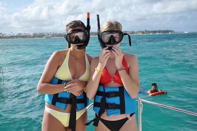 Punta Cana Parasailing & Snorkeling Cruise Experience - Drinks, music, and the onboard party vibe