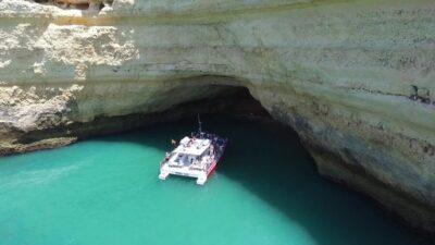 Quarteira: Benagil Cave Guided Catamaran Day Cruise & Drink - The 4-hour flow: Vilamoura sightseeing to Benagil cave interior