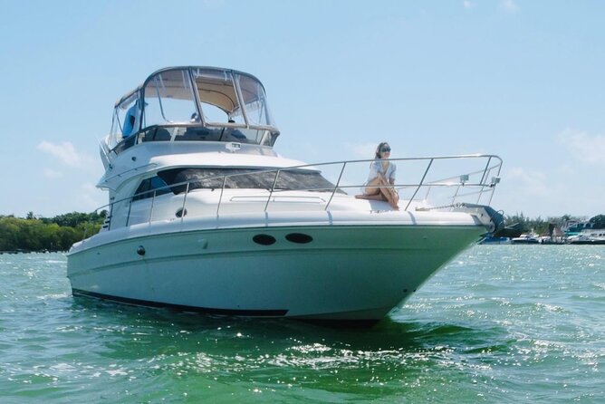 Rent a Private 46ft Yacht in Cancun - Onboard Comfort: Drinks, Music, Restroom, and Heat Reality