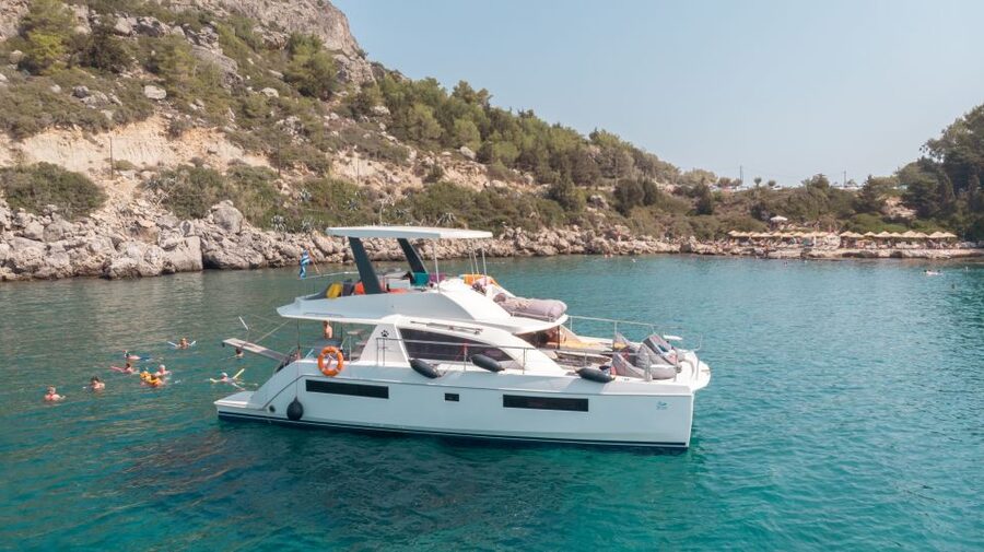 Rhodes: All-Inclusive Catamaran Cruise with Lunch and Drinks - From Mandraki Harbor to your first swim stop
