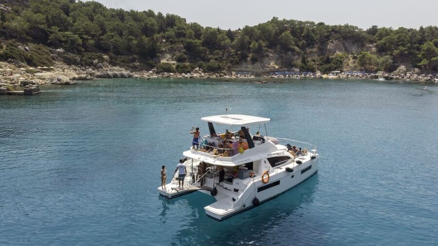 Rhodes: All-Inclusive Catamaran Cruise with Lunch and Drinks - Ladiko Bay: clear water, calmer vibes, and enough time to repeat