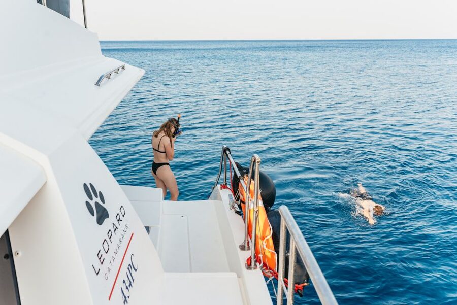 Rhodes: Sunset Catamaran Cruise with Dinner Buffet & Drinks - Music, Deck Time, and the Rhodes Sunset From the Middle of the Sea