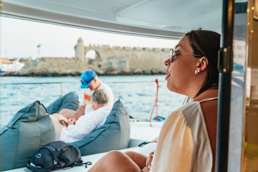 Rhodes: Sunset Catamaran Cruise with Dinner Buffet & Drinks - Who Should Book This and Who Might Skip