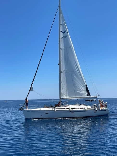 Rhodes: Sunset Catamaran Cruise with Snack, Fruits & Drinks - Onboard Comfort: Snacks, Drinks, and the Little Touches