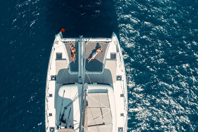 Romantic Sunset Catamaran Caldera Cruise incl. Meal & Drinks - Stop 3: Santorini Hot Springs Area (Swim Time, Not a Guaranteed Warm Bath)