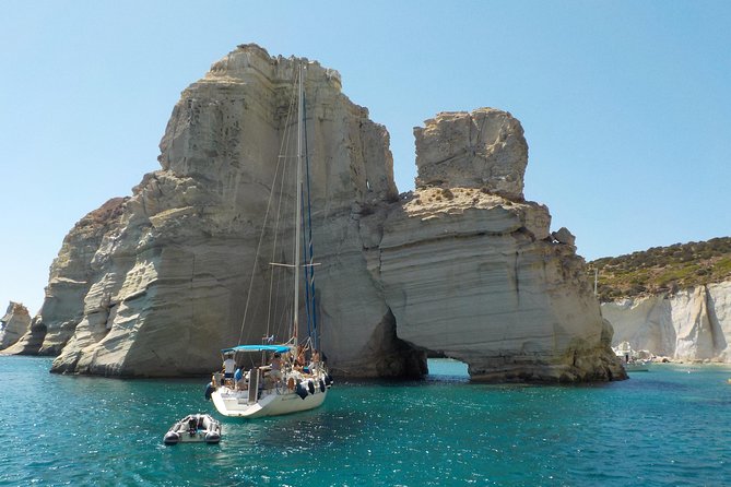 Round of Milos and Poliegos Sailing boat snorkelling cruise - Gerakas: lunch time with perlite sand slides and emerald water