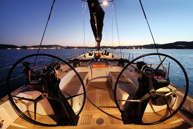 Sail & Dine Sailboat Tour With Sunset - The April 25 Bridge and squares: Commerce Square and the city’s skyline logic