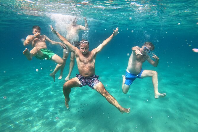 Sail the Athenian Coastline on a Catamaran with Meal & Wine - Stop 2: Vouliagmeni Bay for another swim and big views