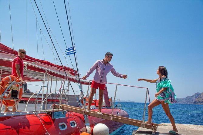 Sailing Catamaran Cruise in Santorini with BBQ, Drinks and Transfer - Snorkeling and swimming reality check: gear helps, comfort matters