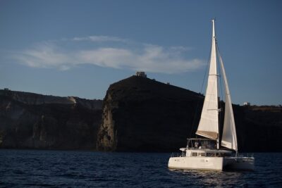 Santorini:All-inclusive Catamaran Cruise with Thirassia Stop - From Thera pickup to Vlichada: the start that keeps the day easy