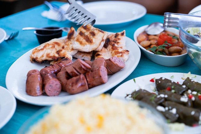 Santorini All-inclusive Catamaran Cruise with Thirassia Stop - Stop 5, Nea Kameni hot springs: warm water with one big warning