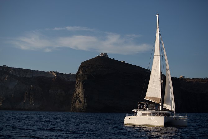 Santorini All-inclusive Catamaran Cruise with Thirassia Stop - The vibe: small-group catamaran cruising on Santorini’s caldera
