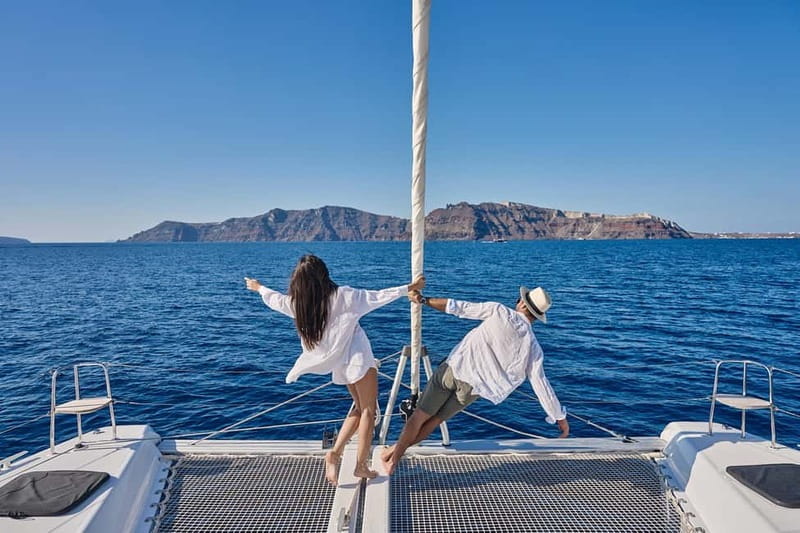 Santorini: Caldera Classic Catamaran Cruise w/ Meal & Drinks - Red Beach: Scarlet Rocks and a Real First Swim