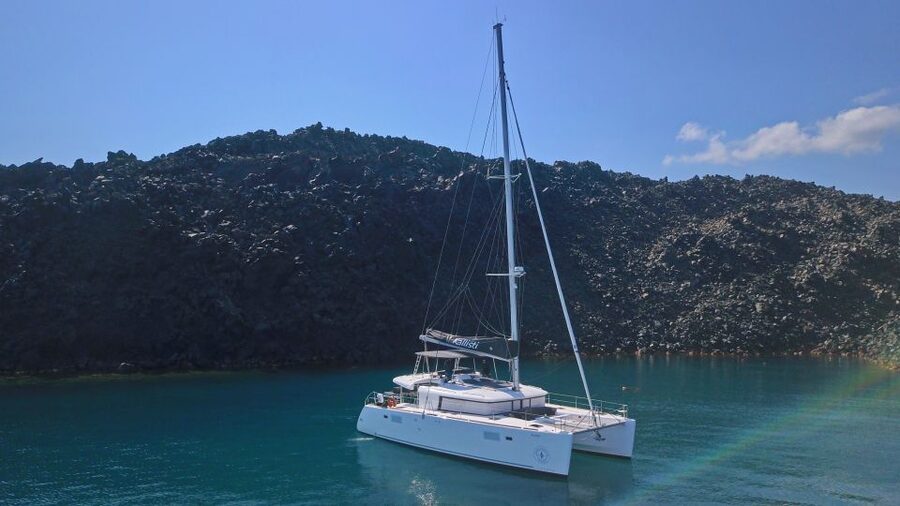 Santorini: Caldera Luxury Catamaran Cruise w/ Meal & Drinks - Mesa Pigadia snorkeling: where the underwater color is the point