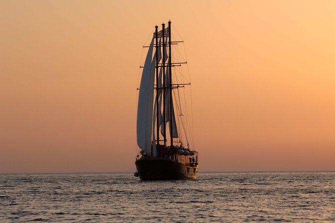 Santorini Caldera Sunset Sailing Cruise with Dinner and Wine - Price and value for a shared sailing day