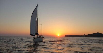 Santorini Caldera: Sunset Sailing Cruise with Meal - Red Beach and White Beach: photos, but also quick context