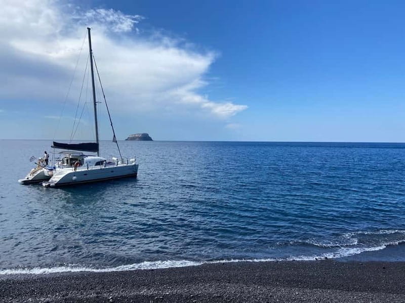 Santorini: Catamaran Cruise with Food and Drinks - Palea Kameni hot springs: warm water, mineral reality, and smart safety