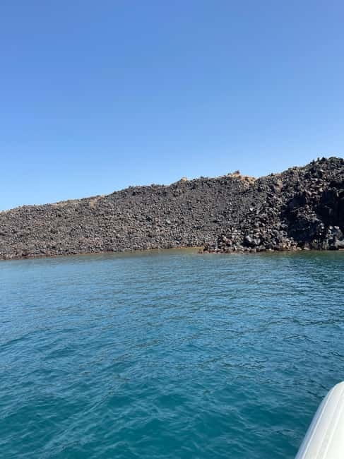 Santorini: Catamaran Cruise with Food and Drinks - Crew, music, and how the vibe actually feels