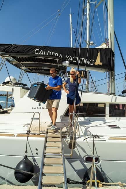 Santorini: Catamaran Cruise with Fresh Meal & Open Bar - From hotel pickup to open sea: the flow that makes this worth it