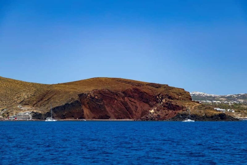Santorini: Catamaran Cruise with Fresh Meal & Open Bar - Black Mountain coves and the swim that breaks up the sail